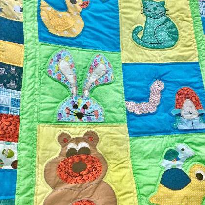Cute hand stitched baby quilted cov..