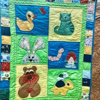 Cute hand stitched baby quilted cov..