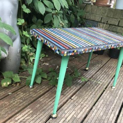 Rainbow retro table with green legs