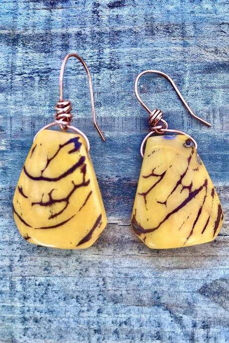 Yellow Tagua nut (vegetable Ivory) dangle earrings with copper ear wires.