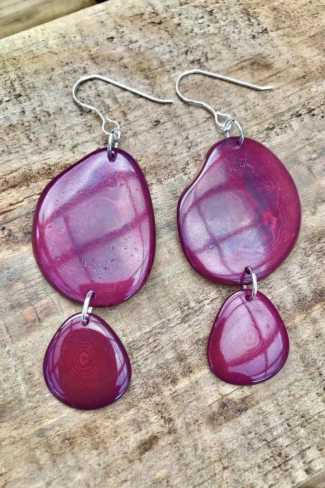 Wine deep red Tagua nut (vegetable Ivory) dangle earrings with sterling silver wires.