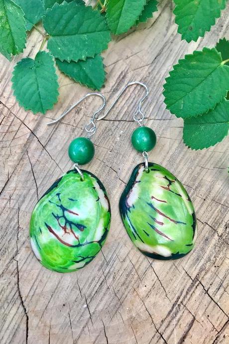 Green Tagua nut (vegetable Ivory) dangle earrings with sterling silver wires.