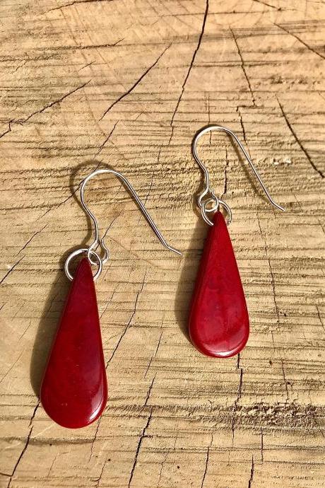 Beautiful ruby red teardrop Tagua nut (vegetable Ivory) dangle earrings with sterling silver wires’